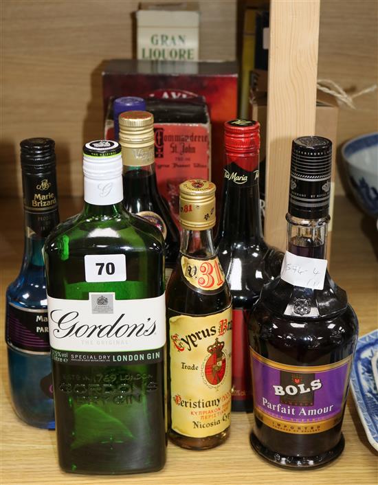 Fourteen assorted spirits including Gordons Gin